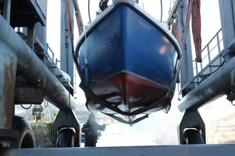Launching boat in Falmouth Cornwall